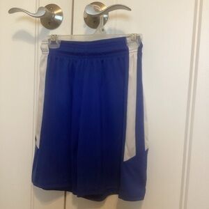 Youth size medium Champro royal blue and white basketball shorts